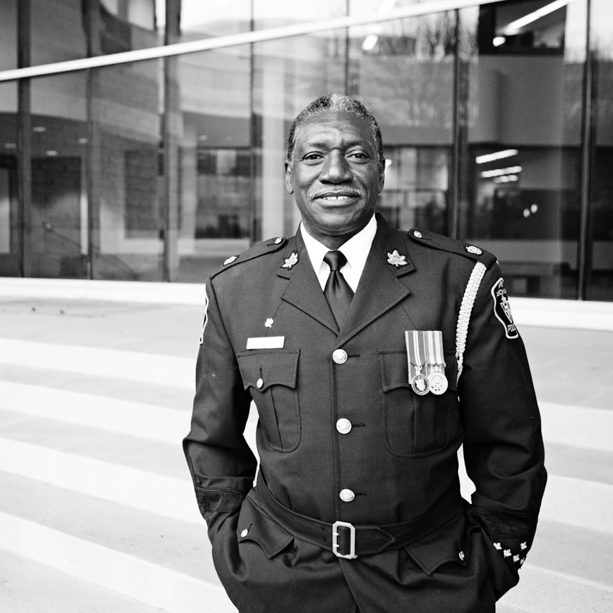 Black-and-white portrait of Superintendent Keith Merith in full dress uniform