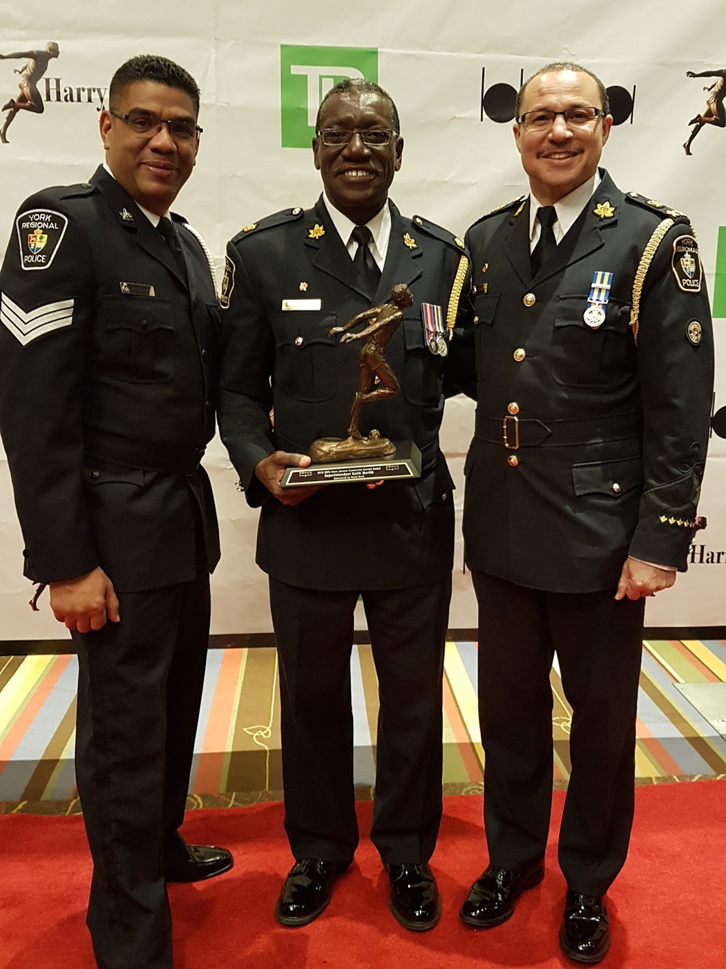 Superintendent Merith receiving the Harry Jerome Community Service Award